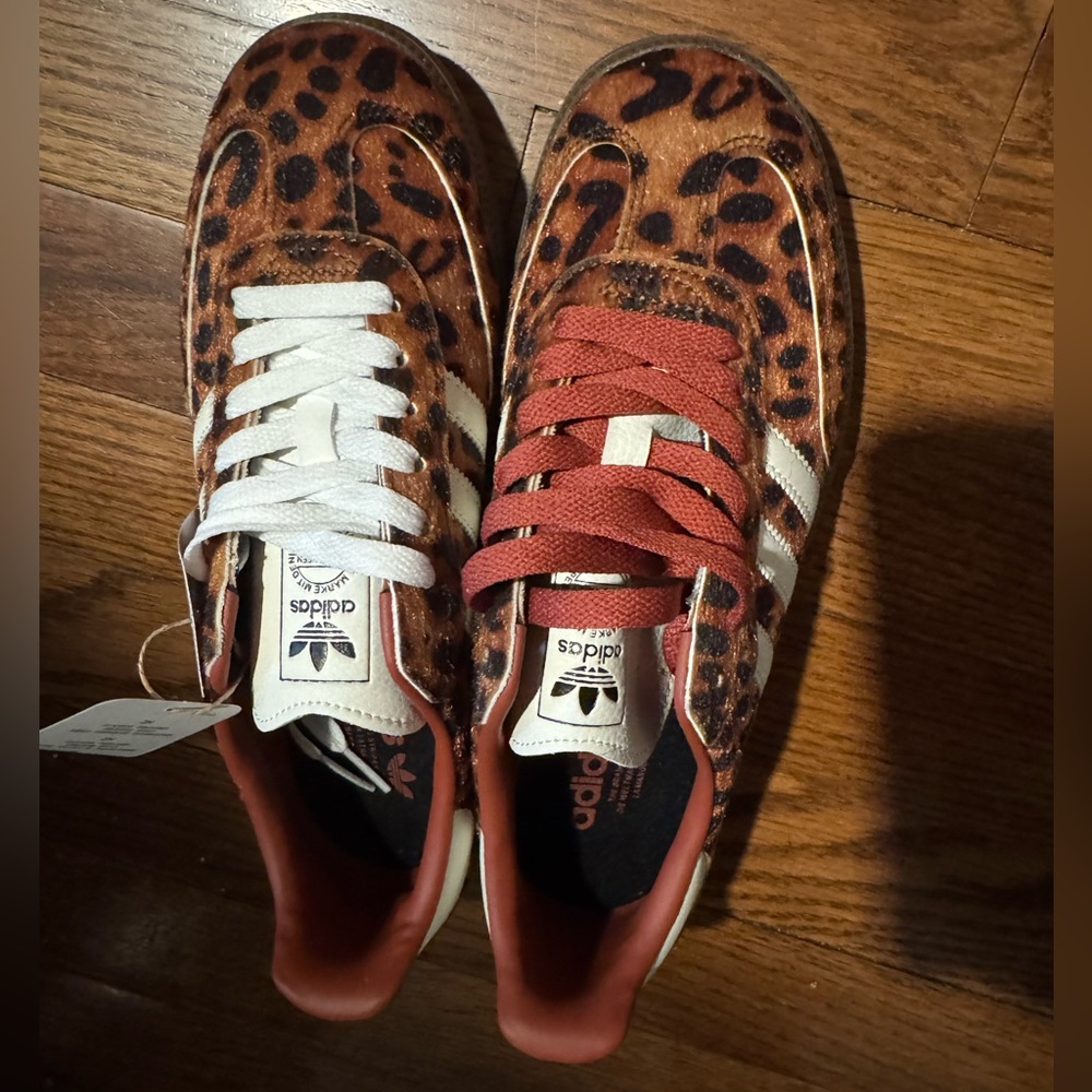 Leopard sneakers. Reps. Excellent quality,never worn. Fits like a 7.5